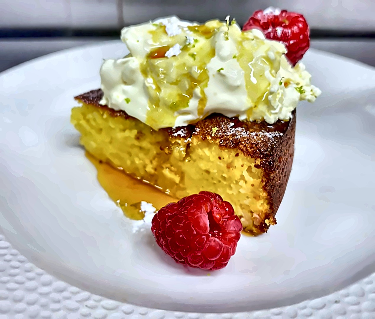 Lemon polenta cake with mascarpone cream and raspberries